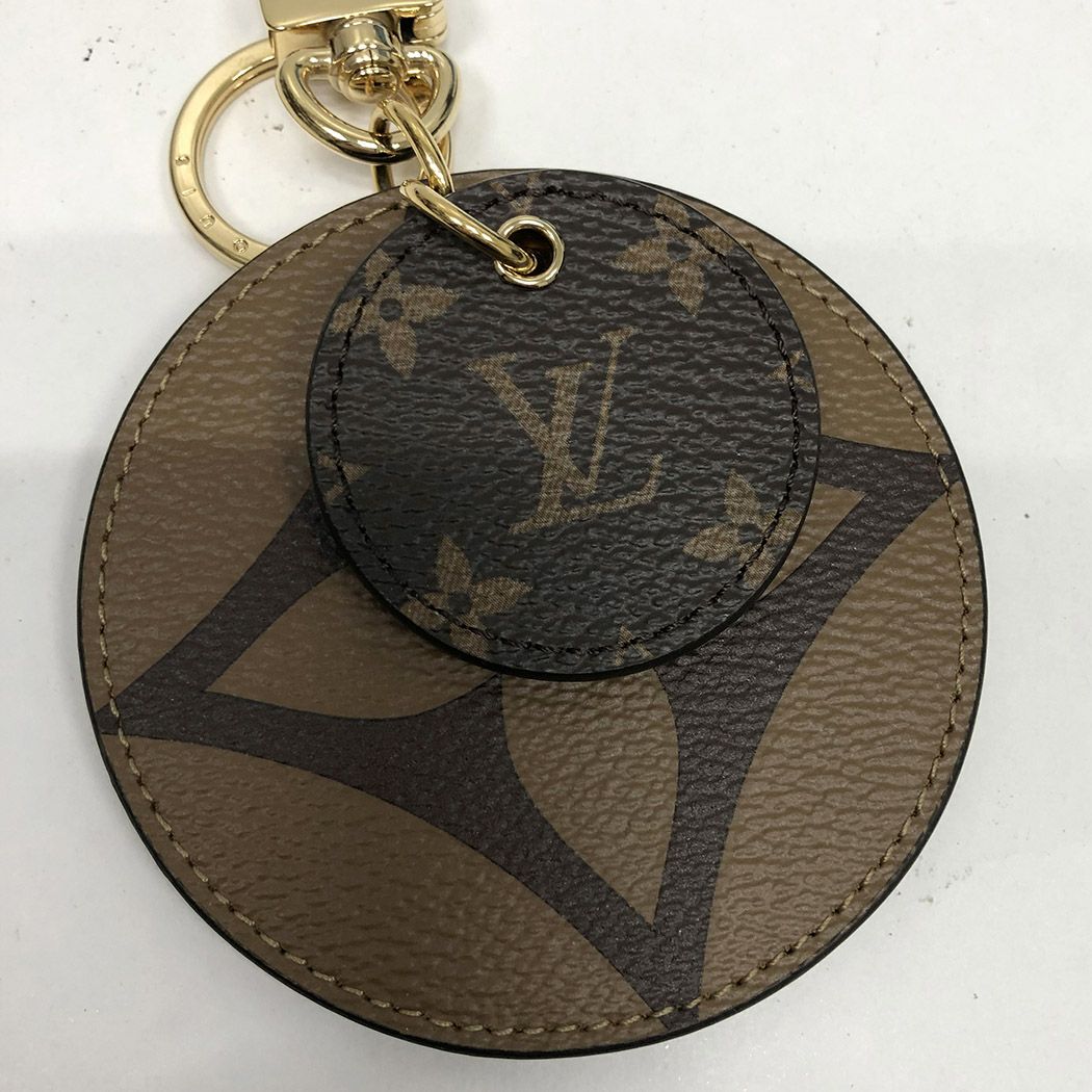 Louis Vuitton Monogram reverse key holder and bag charm (M69317)